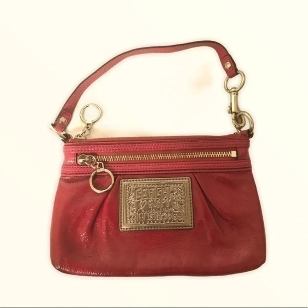 Coach pink patent leather poppy mini bag wristlet